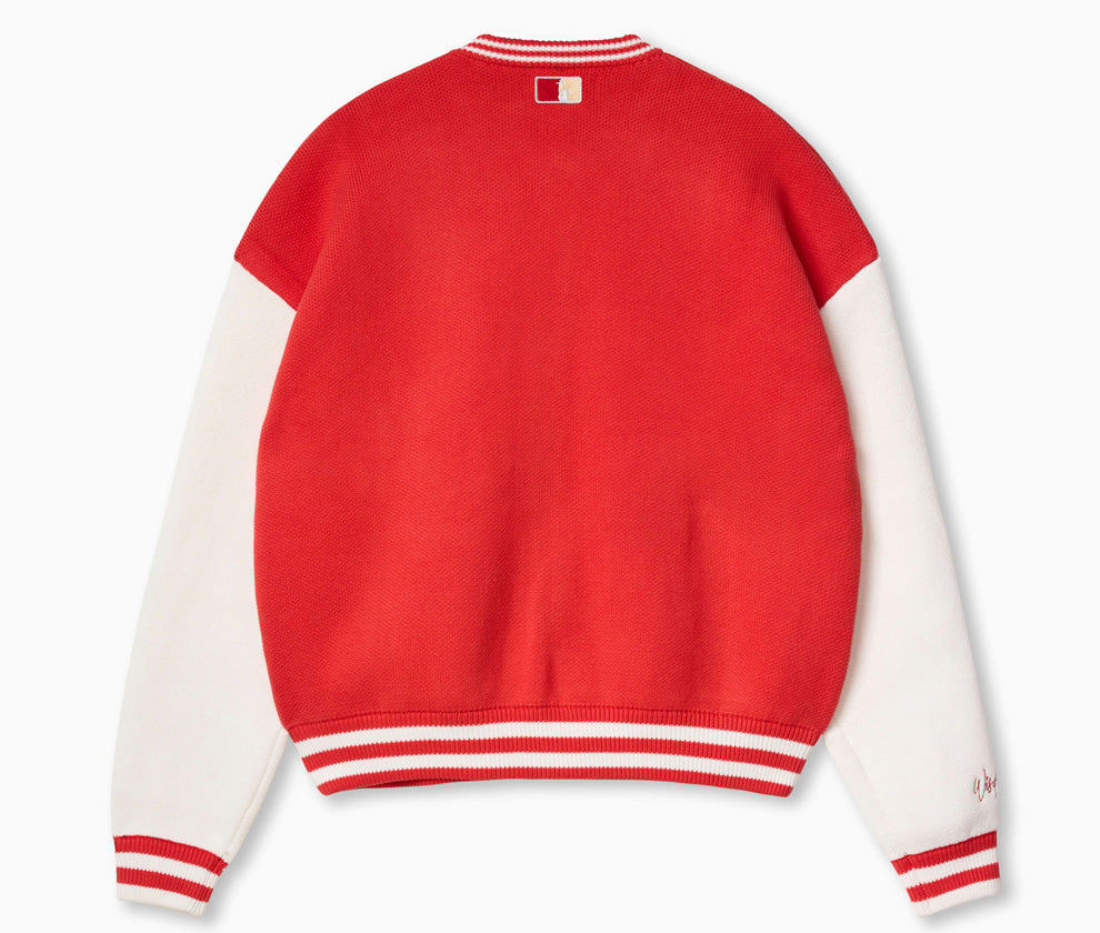 Rear view of Wisdom of Age University Cardigan in Red. Red body with white sleeves. Red and white stripes on the cuff and bottom of the cardigan.