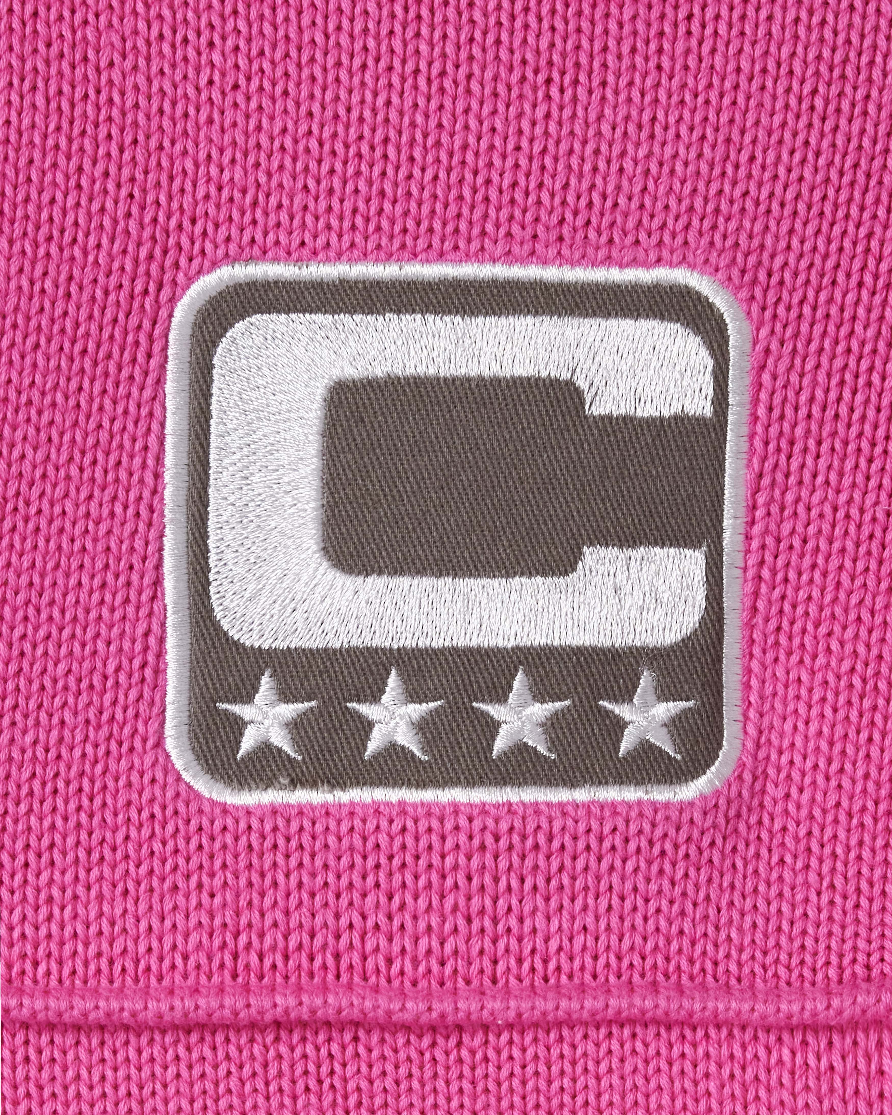 Close-up of embroidered captains patch.