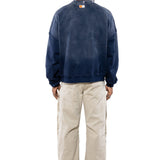Rear view Male Model wearing a navy sweatshirt with the 'NY Tough' logo on the neck and beige cargo pants on a white background