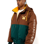 Side view of a Male Model wearing a brown and forest green jacket with yellow accents on a white background.