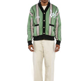 Male model wearing the WOA City cardigan mint on a white background