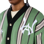 Close up of a Male model wearing the WOA City cardigan mint on a white background.'WA' Logo on the left chest