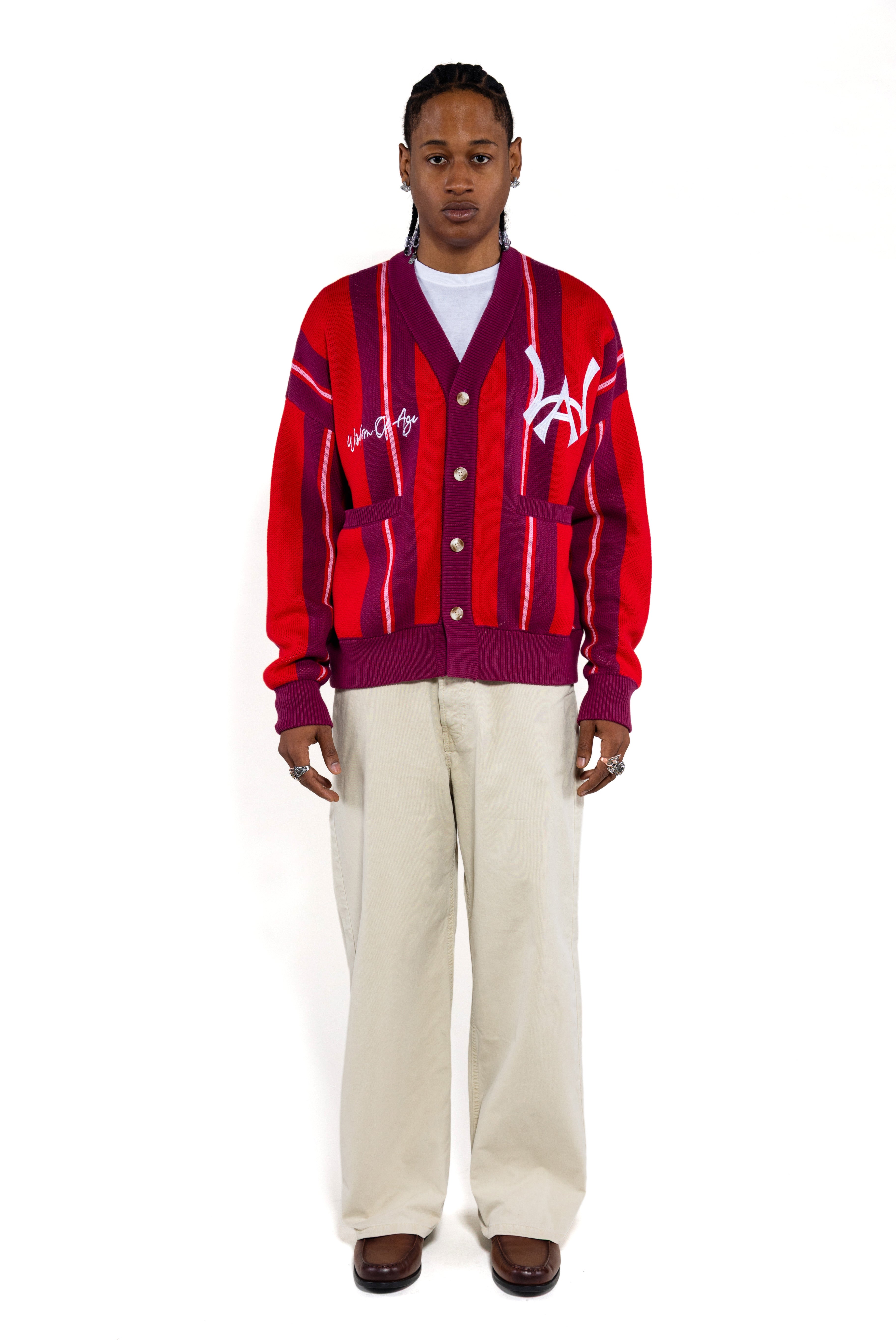 Front full body view of Male Model wearing the Wisdom Of Age City Cardigan in Red Velvet on a white background.