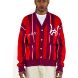 Male model wearing the Wisdom Of Age City Cardigan in Red Velvet on a white background.