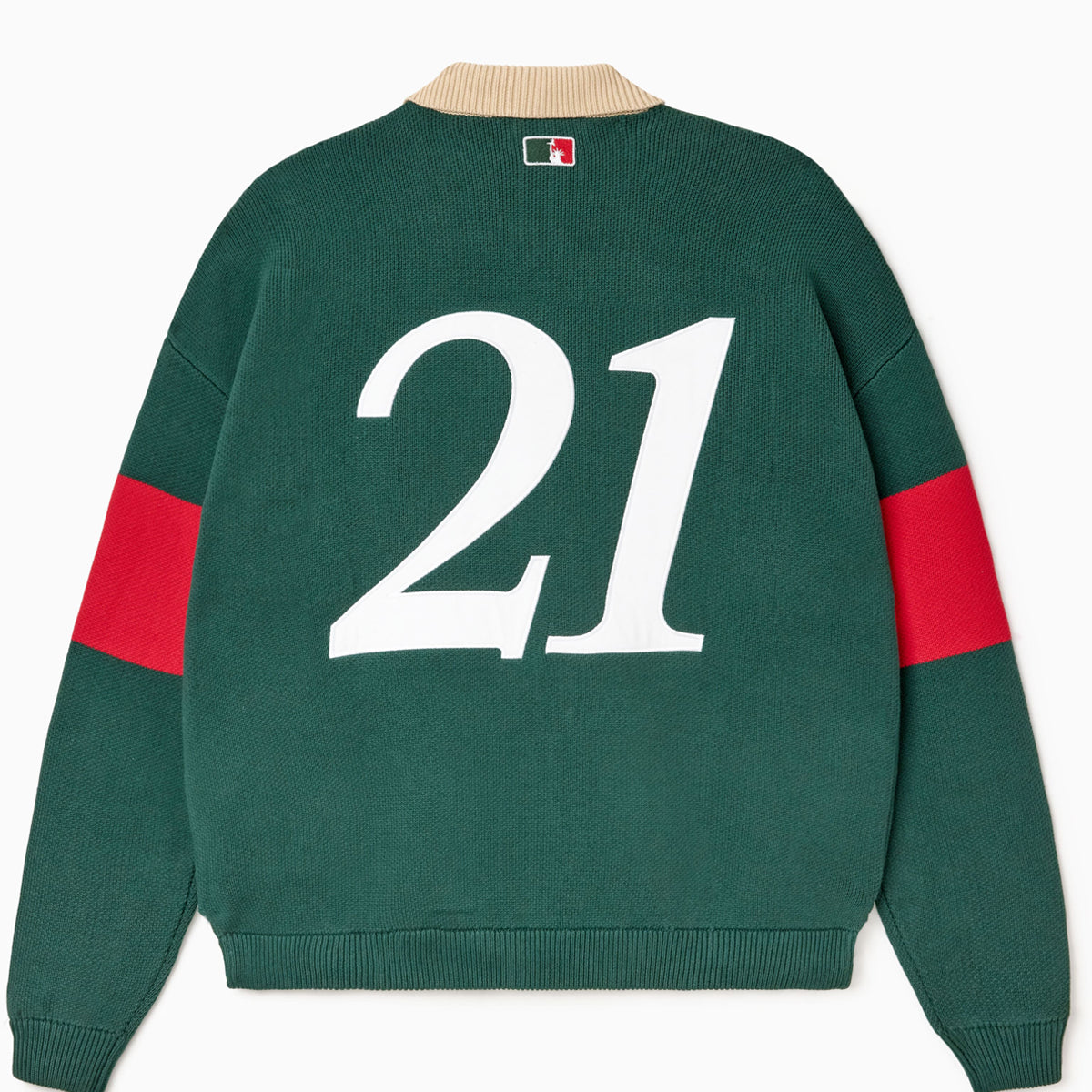 Green rugby sweater with number 21 on the back against a white background