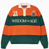 Green and orange rugby sweater with 'Wisdom of Age' text on a white background