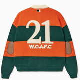 Sweater with '21 W.O.A.F.C.' embroidered on a white background.