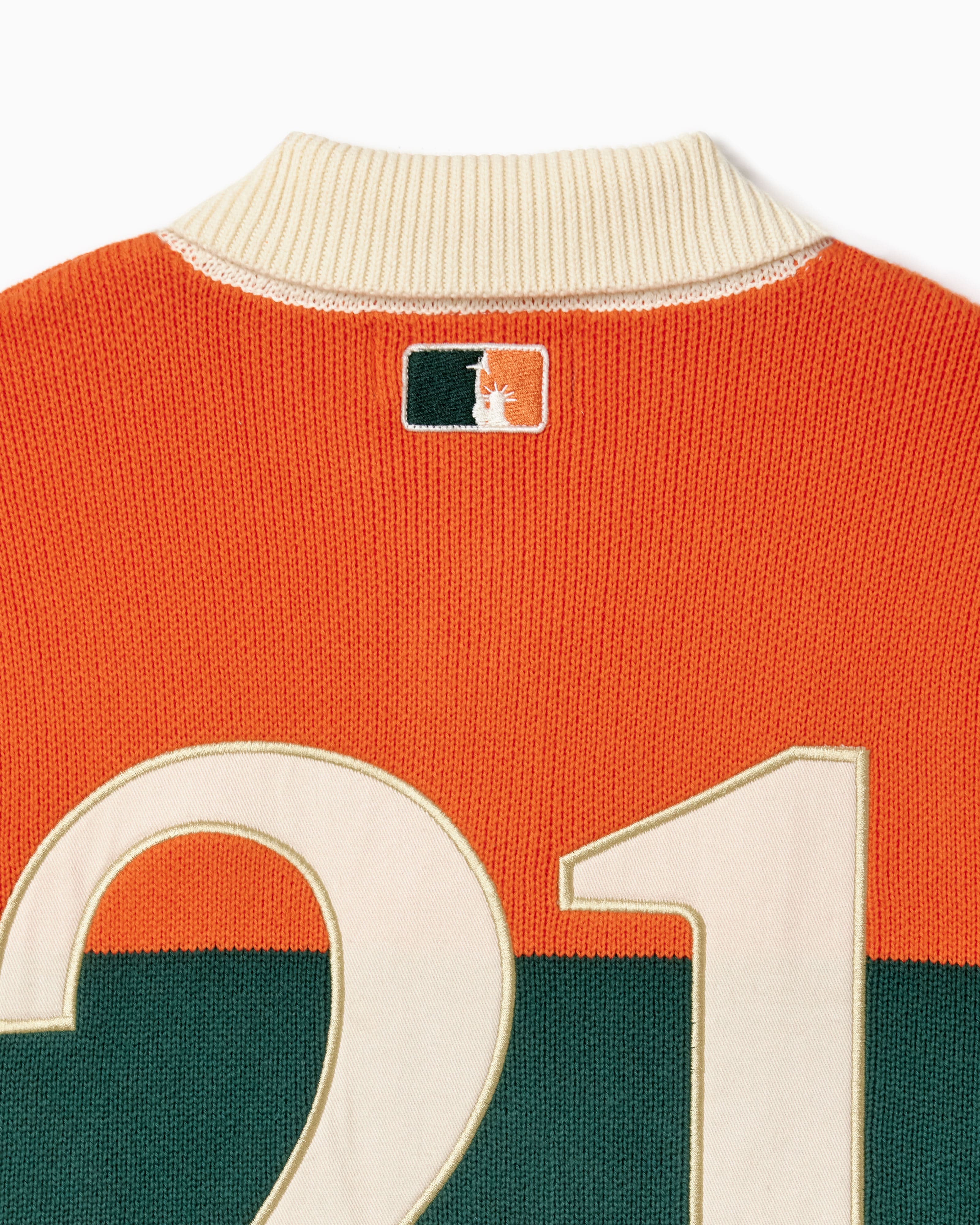 Close-up of the back of the collar, WOA logo and the number 21.