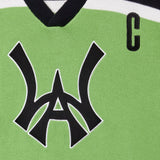 Close Up Of The Wisdom Of Age Knit Hockey Jersey Neon Front View