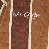 Brown knitted fabric with 'Wisdom of Age' embroidery