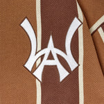 Close up of the WOA Knitted Brown and beige striped cardigan with WA logo on the left chest on a white background.