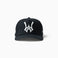 Wisdom of Age black snapback hat featuring embroidered logo and structured A-frame silhouette on white background.