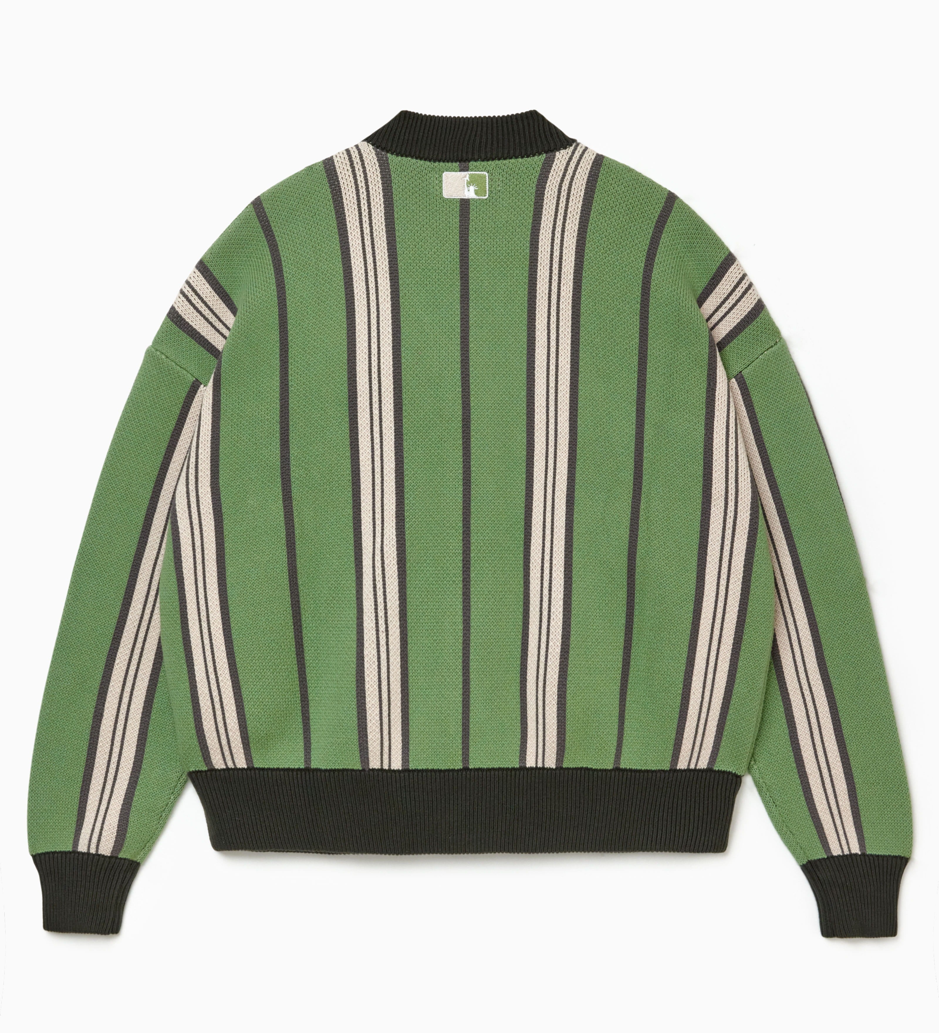 Rear view of the Wisdom Of Age City Cardigan in Sage Green with striped pattern and the NY Tough logo on a white background
