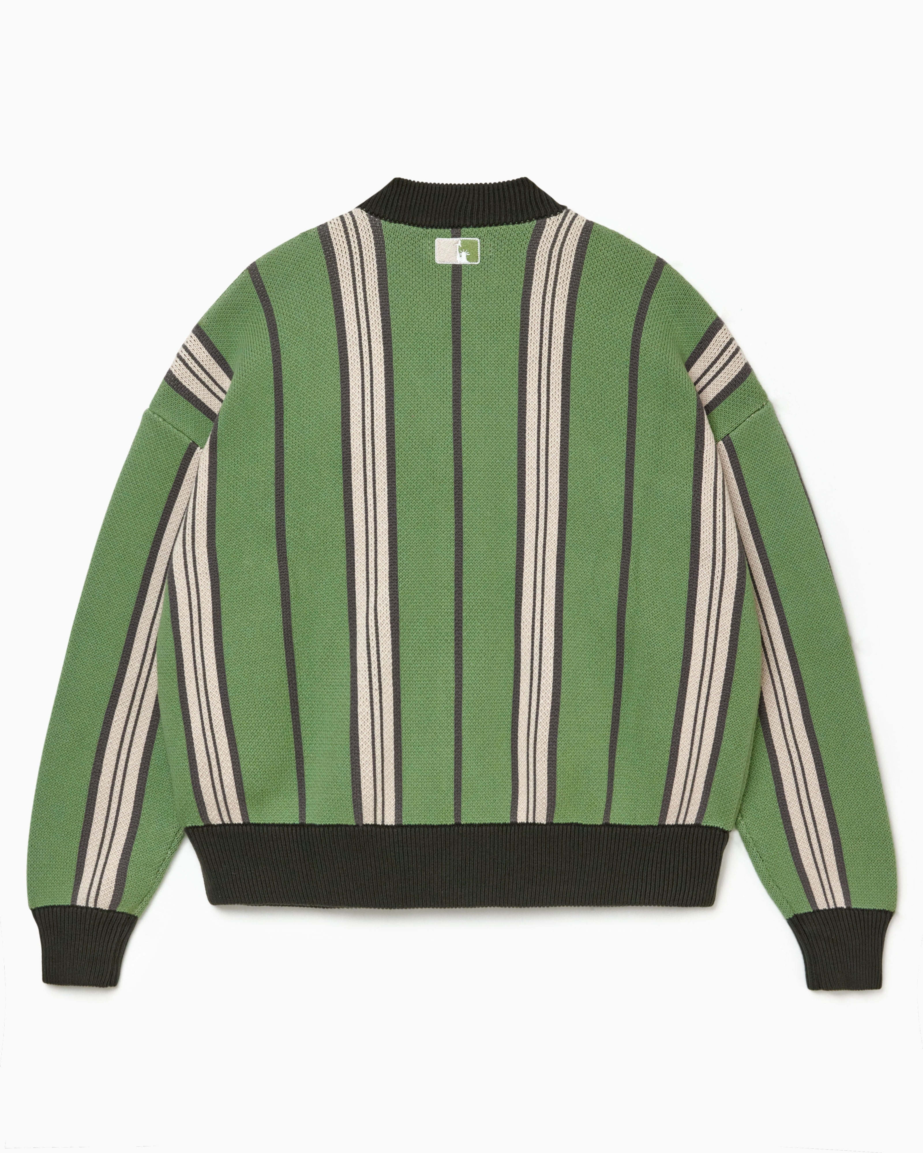 Rear view of the Wisdom Of Age City Cardigan in Sage Green with striped pattern and the NY Tough logo on a white background
