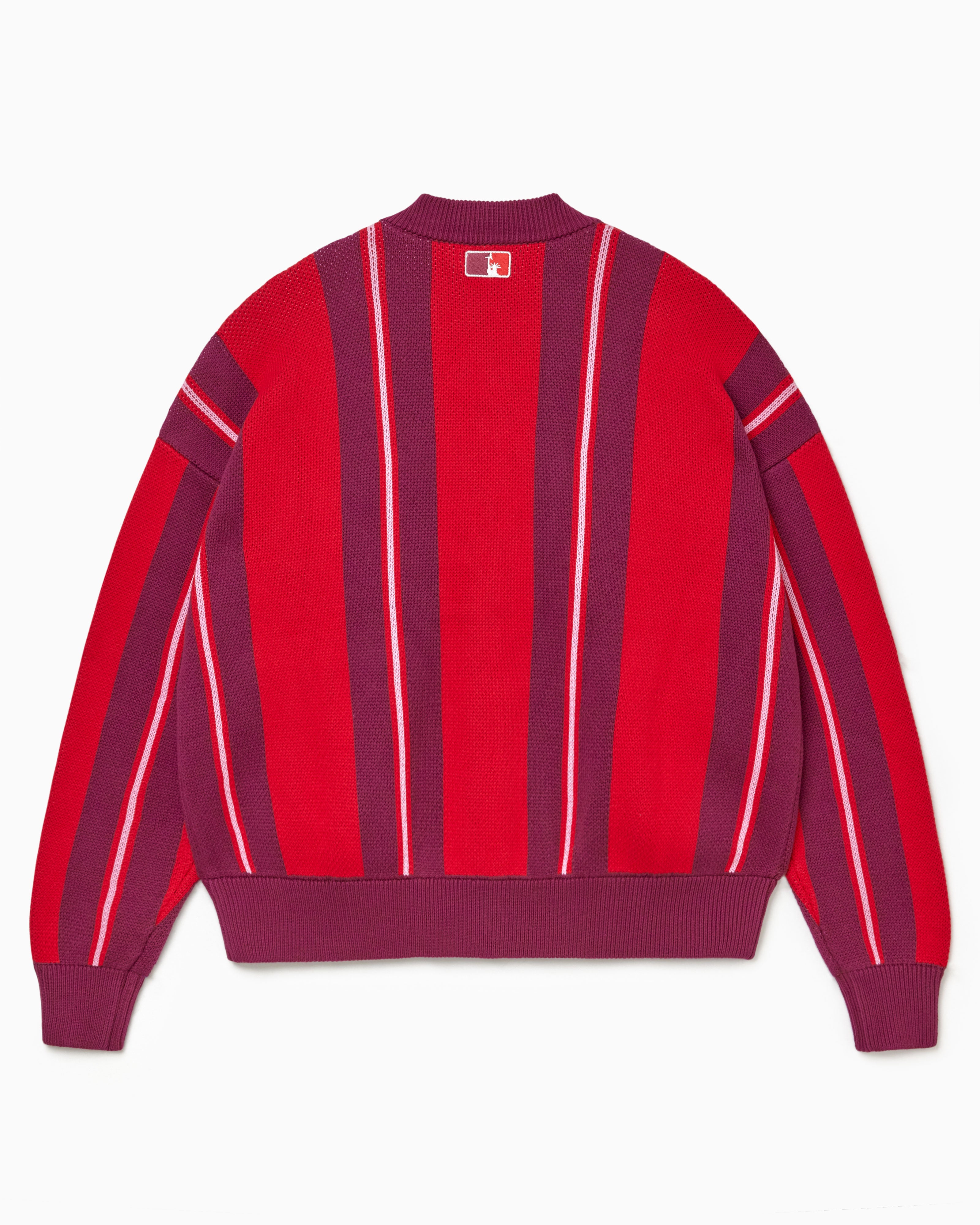 Rear view of the Wisdom Of Age City Cardigan in Red Velvet on a white background.