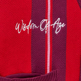 Red and purple cardigan with 'Wisdom of Age' embroidery