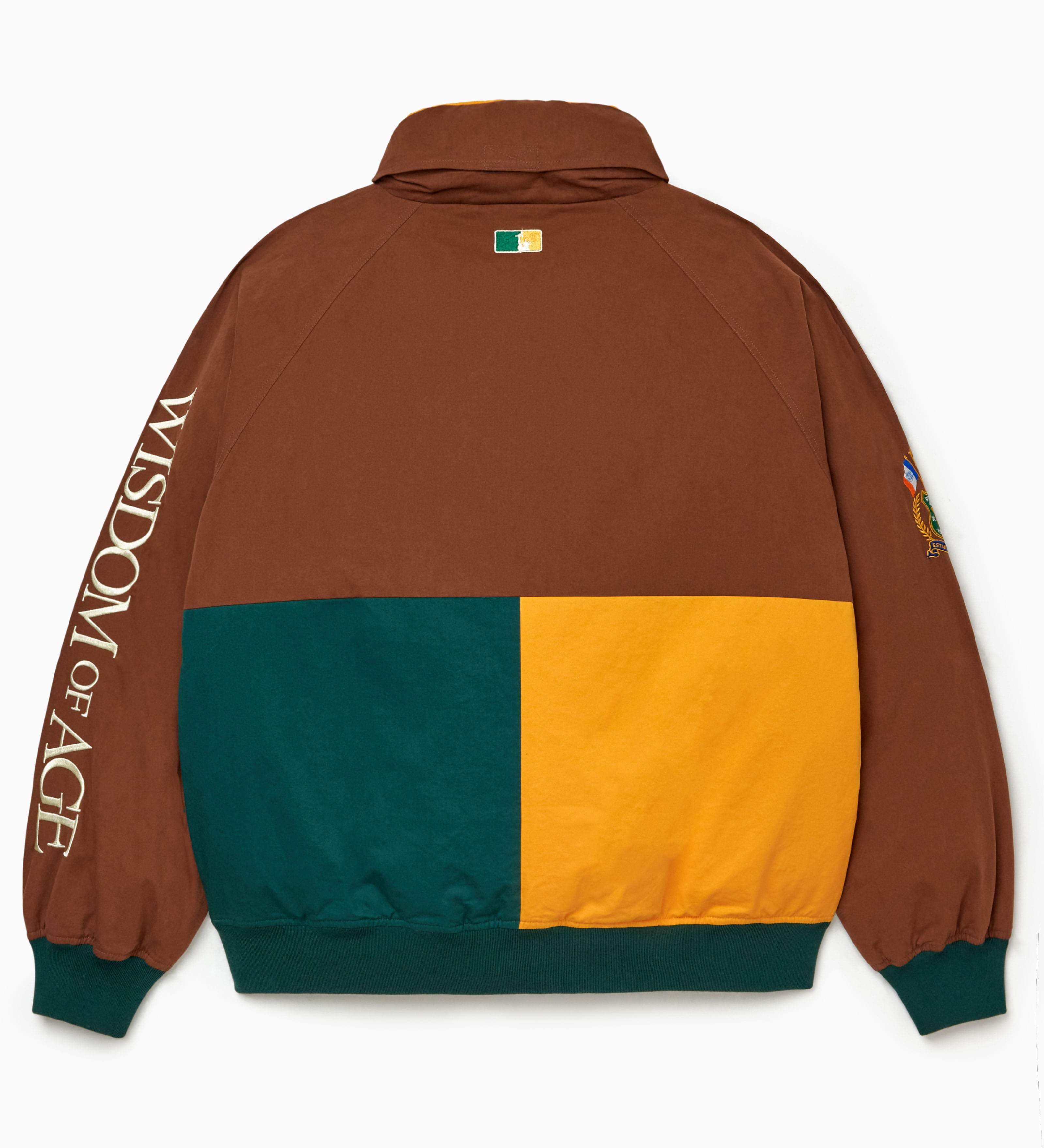 Mocha/ Marine Green/Yellow Color-blocked jacket with 'Wisdom of Age' branding on a white background