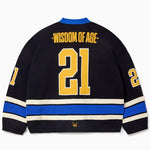 Rear view of the Wisdom Of Age Knit Hockey jersey Navy. Wisdom Of Age on the name plate with the number 21 in yellow underneath