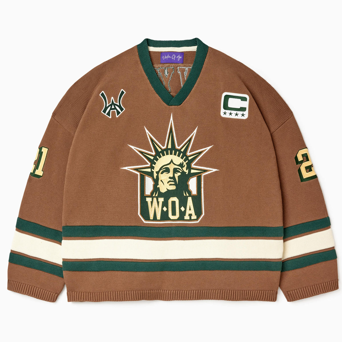 Front view of the Wisdom Of Age Knit Hockey jersey Autumn. WOA Liberty logo on the front with  and captains C on the left shoulder and a WA patch on the right shoulder. the number 21 on the sleeves