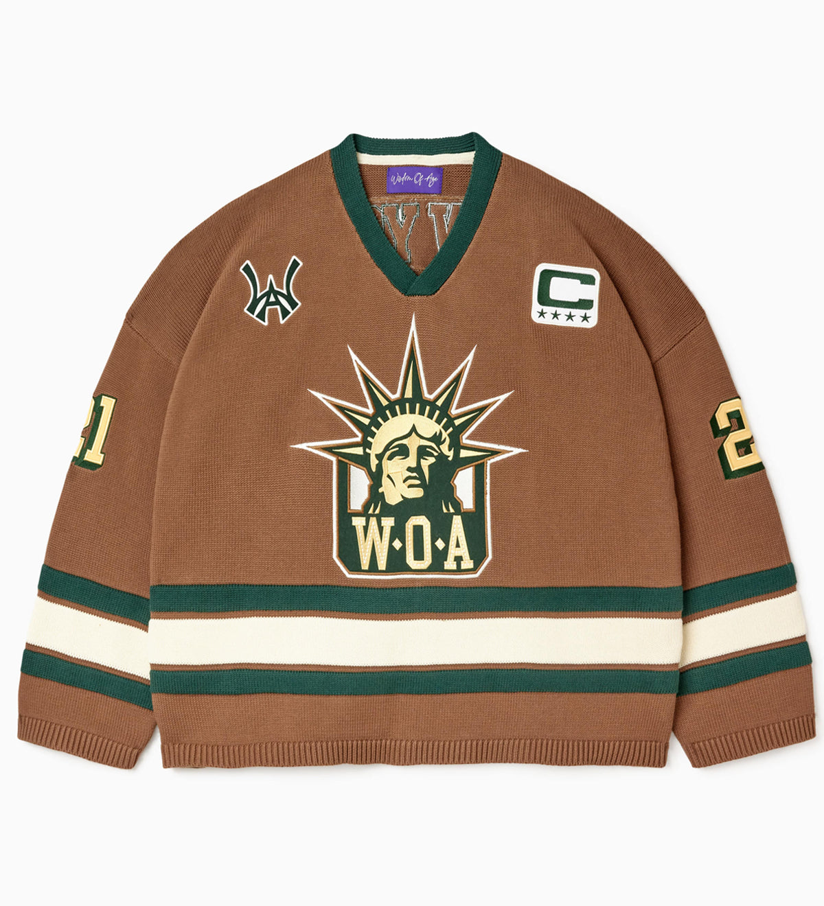 Front view of the Wisdom Of Age Knit Hockey jersey Autumn. WOA Liberty logo on the front with  and captains C on the left shoulder and a WA patch on the right shoulder. the number 21 on the sleeves
