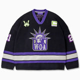 Front view of the Wisdom Of Age Knit Hockey jersey Midnight. WOA Liberty logo on the front with  and captains C on the left shoulder and a WA patch on the right shoulder. the number 21 on the sleeves