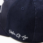 Wisdom Of age Logo Fitted Hat Navy side view Close up