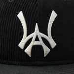 Wisdom Of age Skyline Fitted Hat black front logo view Close up