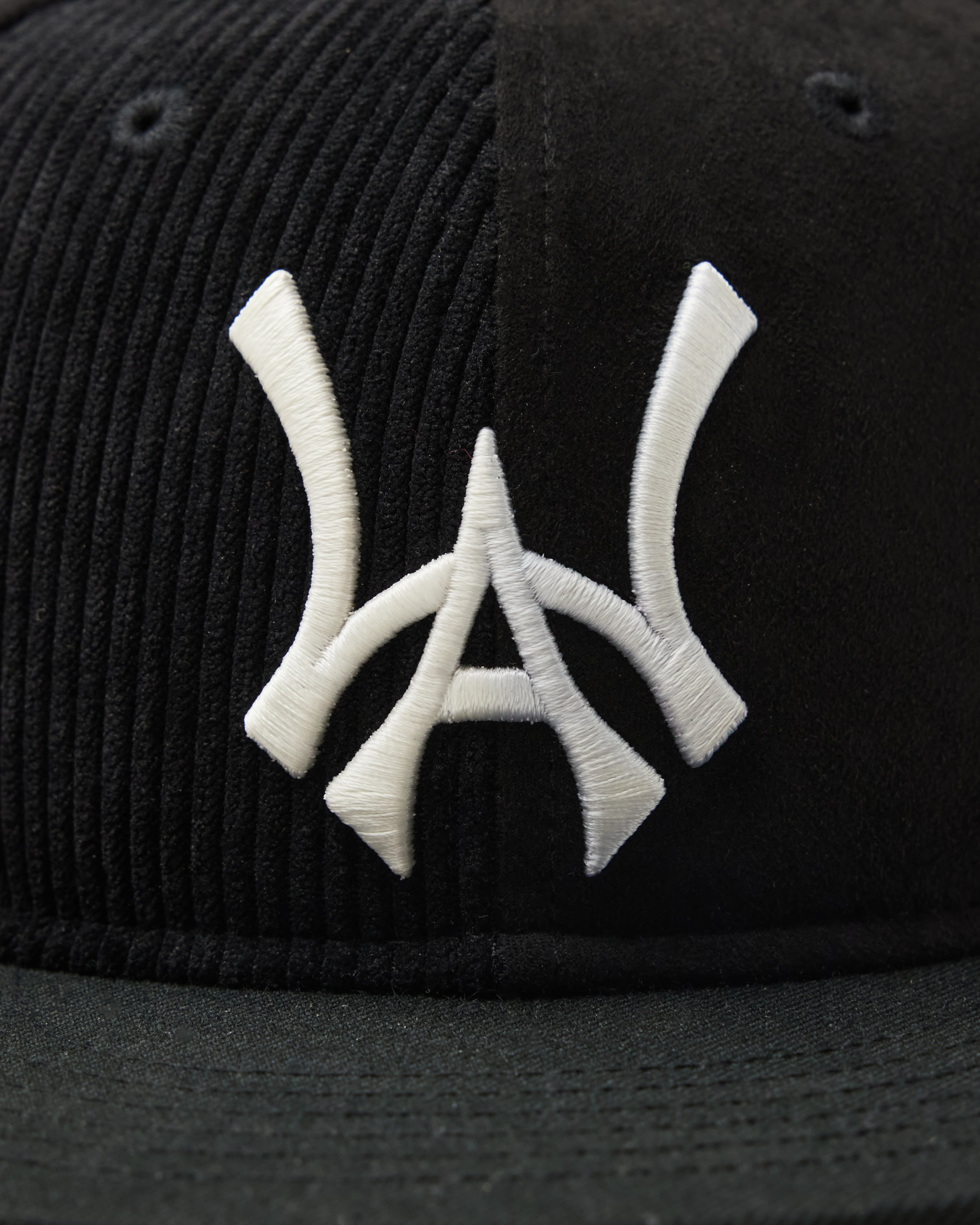 Wisdom Of age Skyline Fitted Hat black front logo view Close up