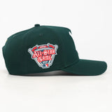 Green baseball cap with a WOA All-Star Game 2021 logo on a white background
