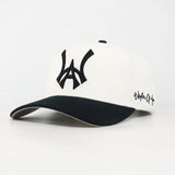 White and Black baseball cap with a Black WA logo on a white background