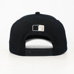 Black snapback cap with the WOA Liberty logo on the back against a white background