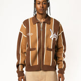 Male model wearing the WOA Knitted Brown and beige striped cardigan with WA logo on the left chest and 'Wisdom Of Age' written in script on the right chest on a white background.