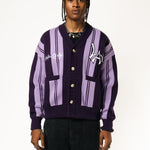 Front View Of a Male Model wearing WOA Knitted purple cardigan on a white background.
