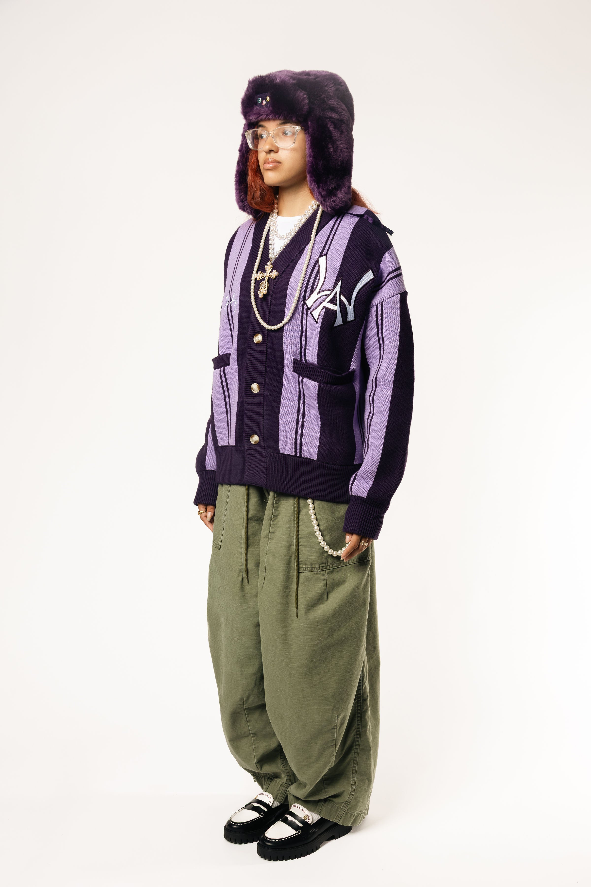 Full body Front View Of a female Model wearing WOA Knitted purple cardigan on a white background.