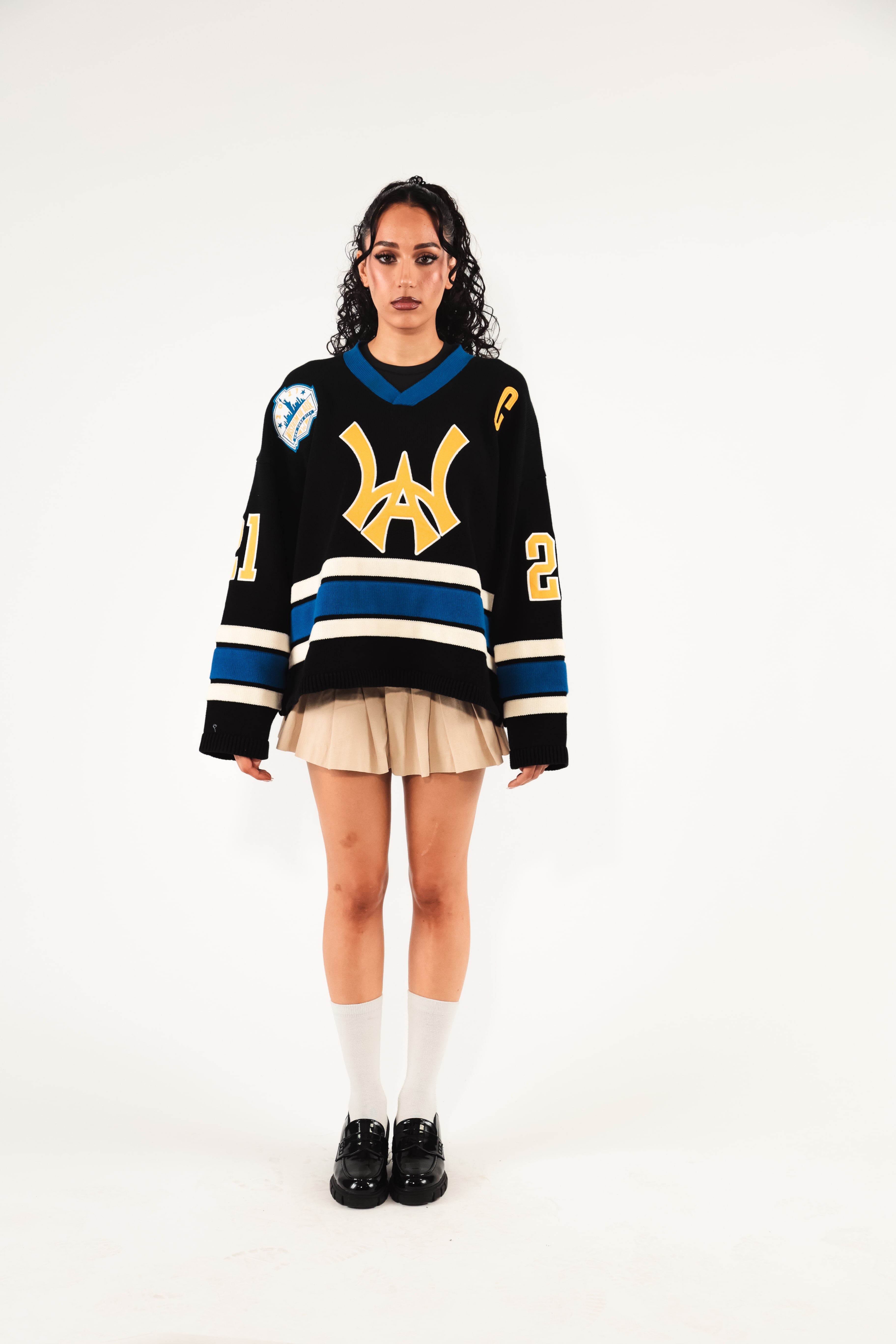 Female model Wearing The Wisdom Of Age Hockey Jersey - Static Shock