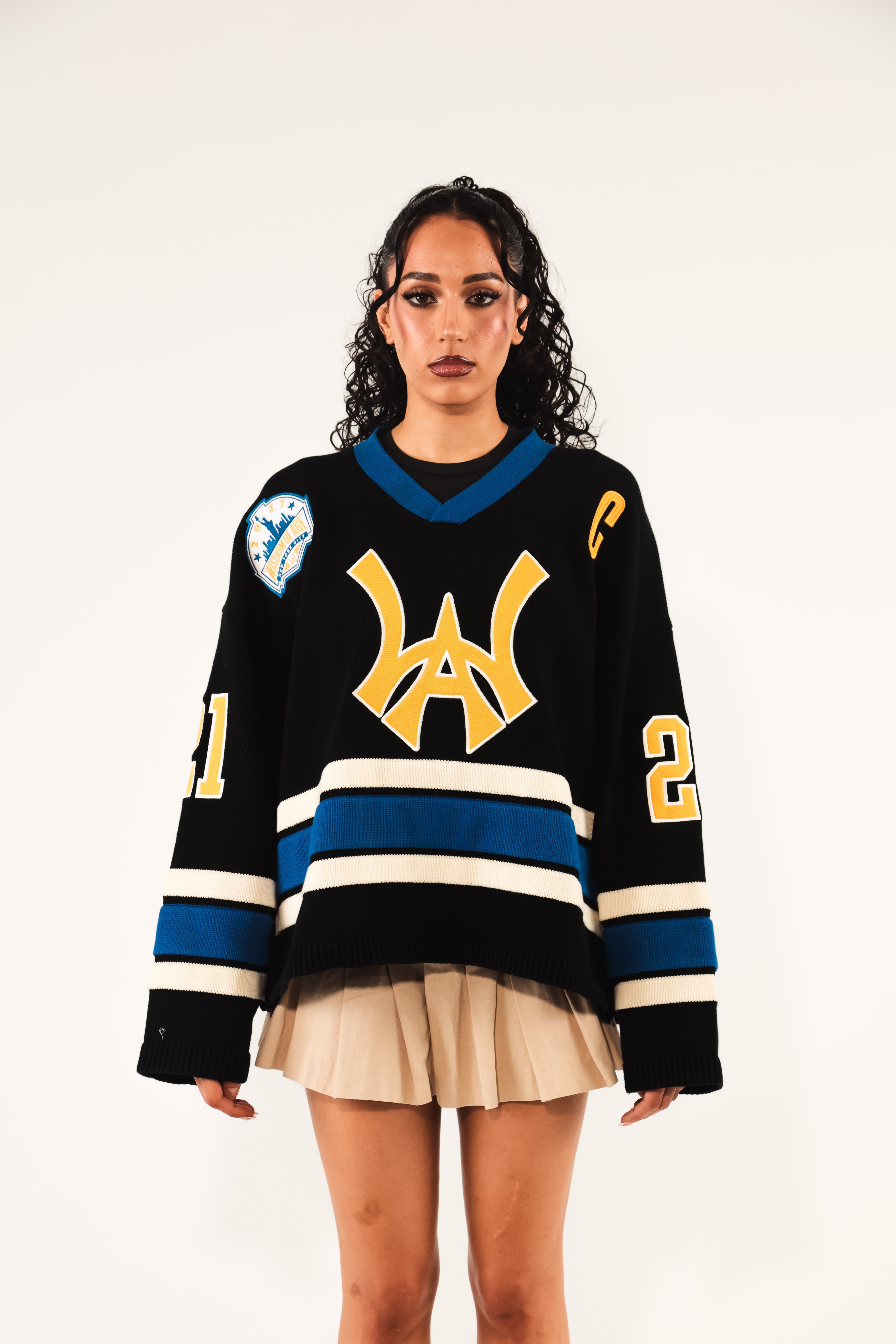 Female model Wearing The Wisdom Of Age Hockey Jersey - Static Shock