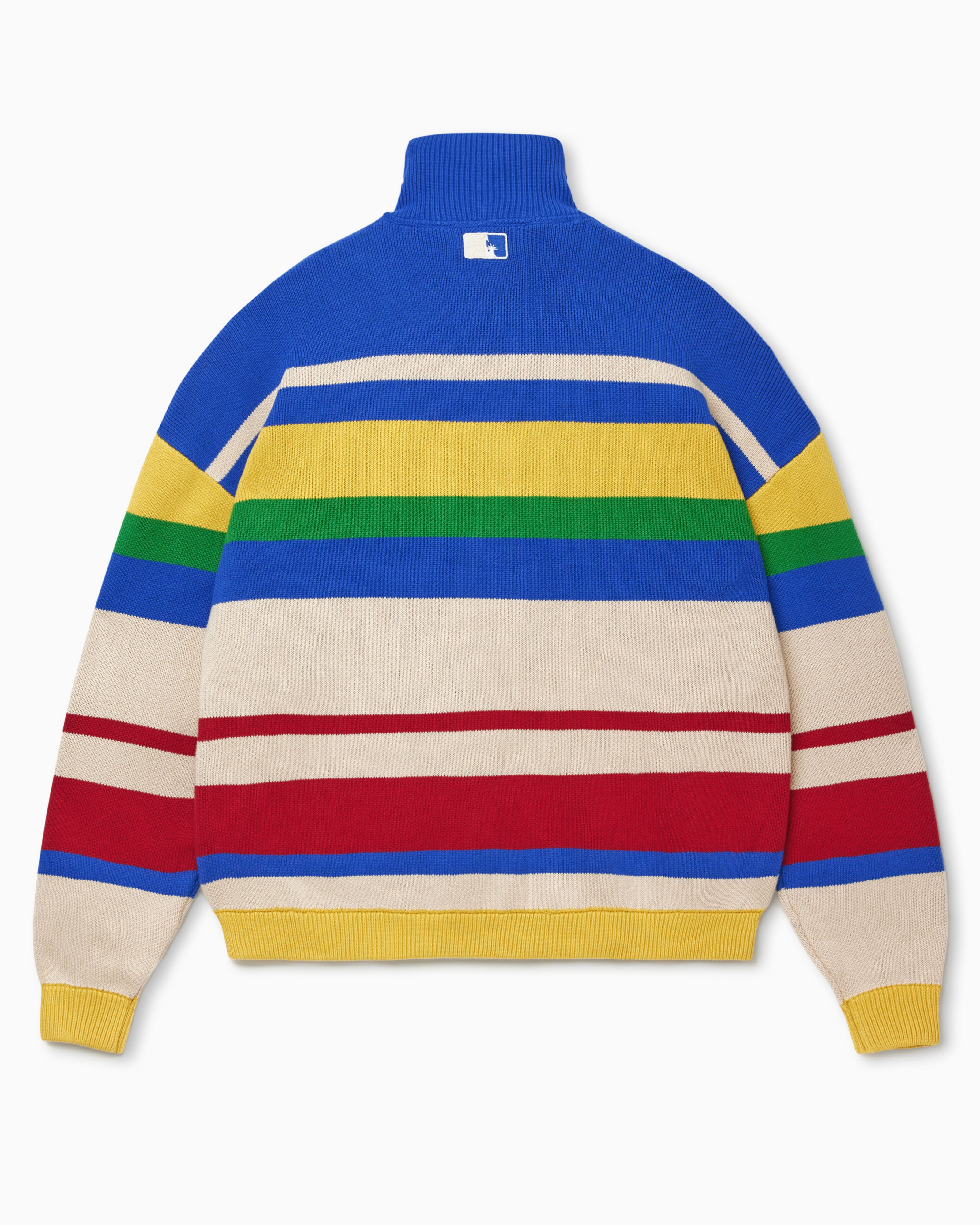 Colorful striped sweater with a NY Tough on the neck against a white background