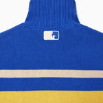 Blue, white, and yellow striped sweater with the NY Tough on a white background