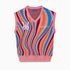 Colorful striped sweater vest with the WA logo and Wisdom Of Age embroidered on a white background