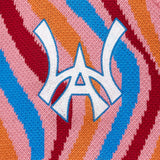 Close-up of a colorful fabric with the WA in the center