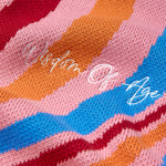 Colorful fabric with 'Wisdom of Age' embroidery
