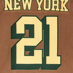 Close up of the back of the WOA Hockey Jersey in Autumn. 'New York' on the name plate and number '21' 