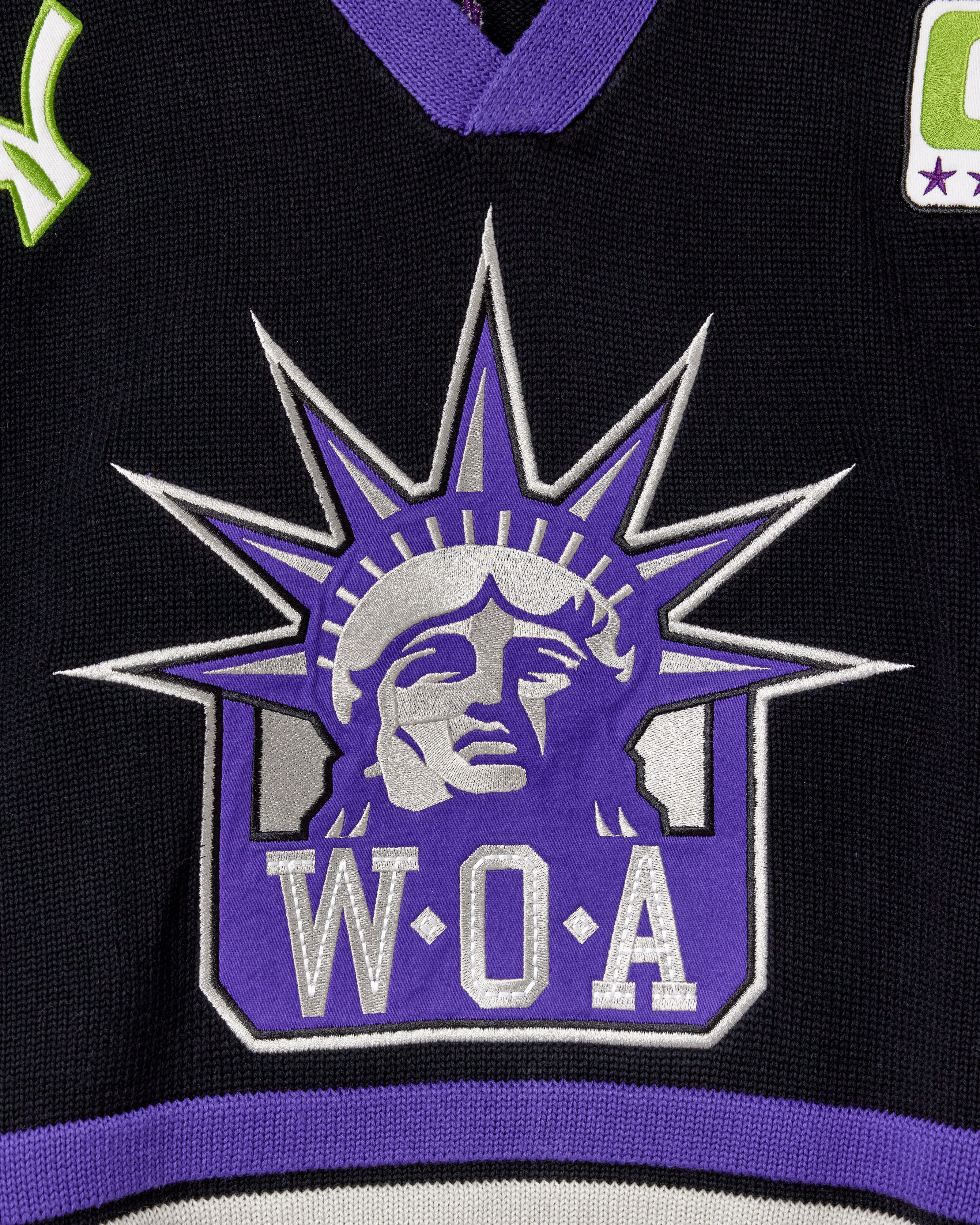 Close up of the WOA Liberty Embroidered on the front.