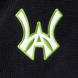 WA logo in white with a neon green outline

