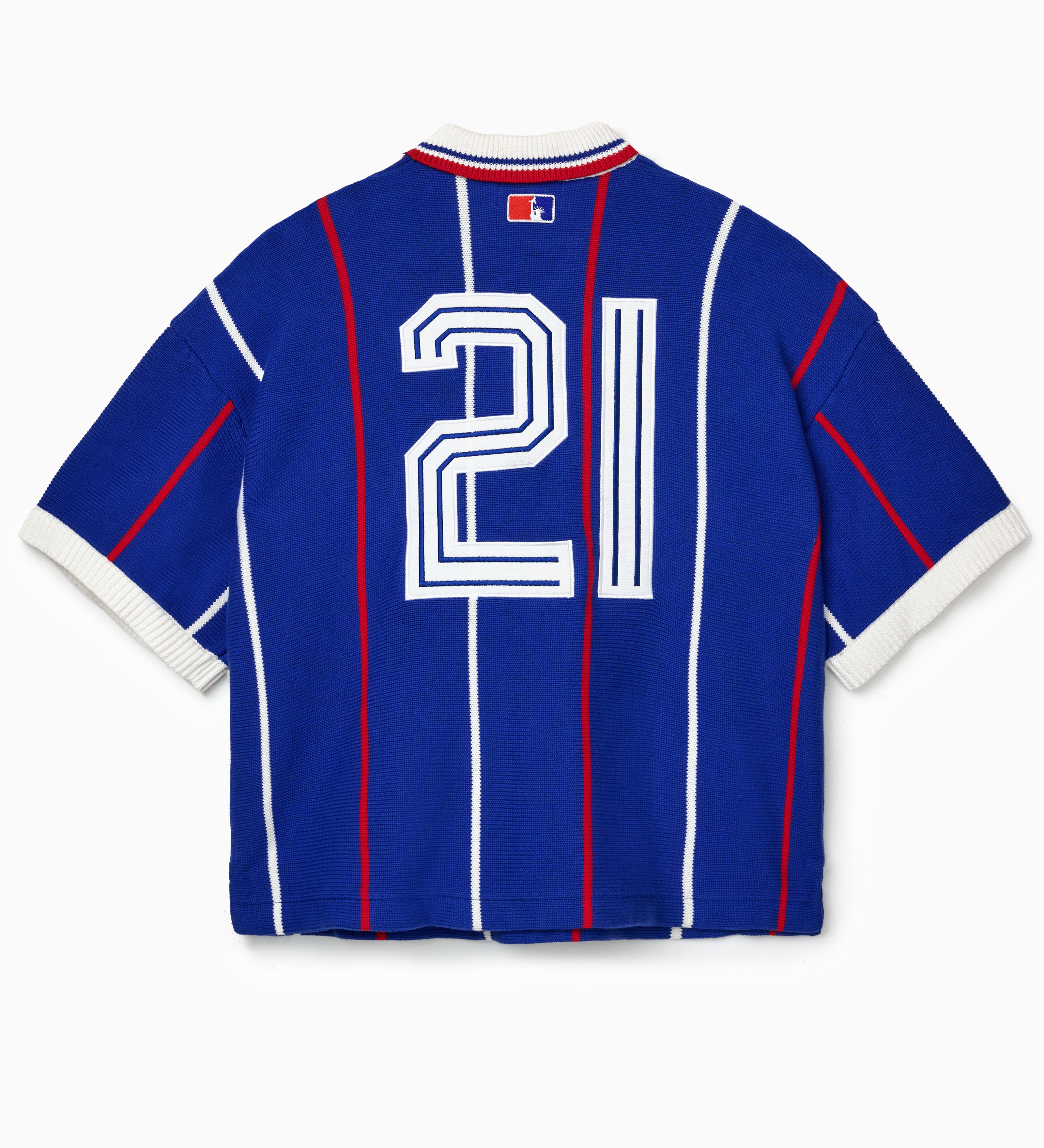 Rear of the Blue knitted soccer jersey with white and red accents featuring '21' text on a white background.