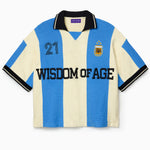 Wisdom Of Age Knit Soccer Jersey Celeste. Blue and beige striped Knitted Soccer Jersey with 'Wisdom of Age' text on a white background