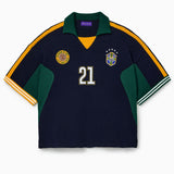 Wisdom Of Age Knit Soccer Jersey Rio. Black Knitted Soccer jersey with yellow accents and a logo on a white background