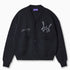Wisdom of Age Black City Cardigan, Black Cat color wave with the WOA symbol on the top left side of the chest and the brand name “Wisdom of Age” written in script cursive on the upper right side. Two drop-in slip pockets on both sides and a 4 button placket with a v-neck drop.