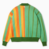 Back of Wisdom of Age Green & Orange City Cardigan. The symmetrical split continues on the the back.