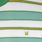 Close-up of a striped sweater with the WA logo in yellow on a white background